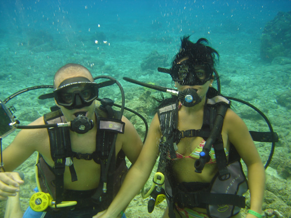 SCUBA Divers Visiting From Spain Diving In Cozumel